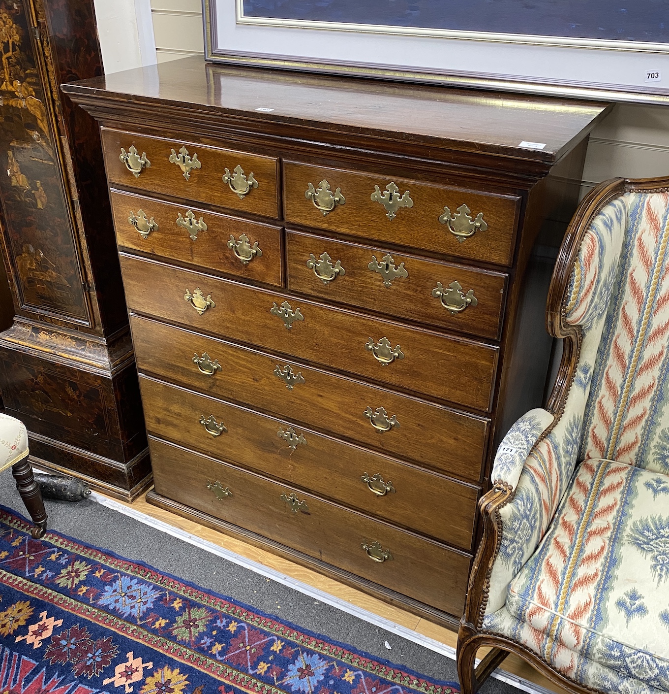 A George III mahogany chest of four short and four long drawers, width 114cm, depth 51cm, height 125cm